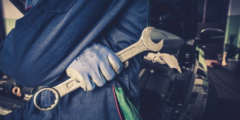 car mechanic with wrench